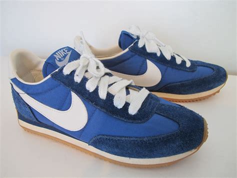 blue and white nike sneakers|nike white with blue swoosh.